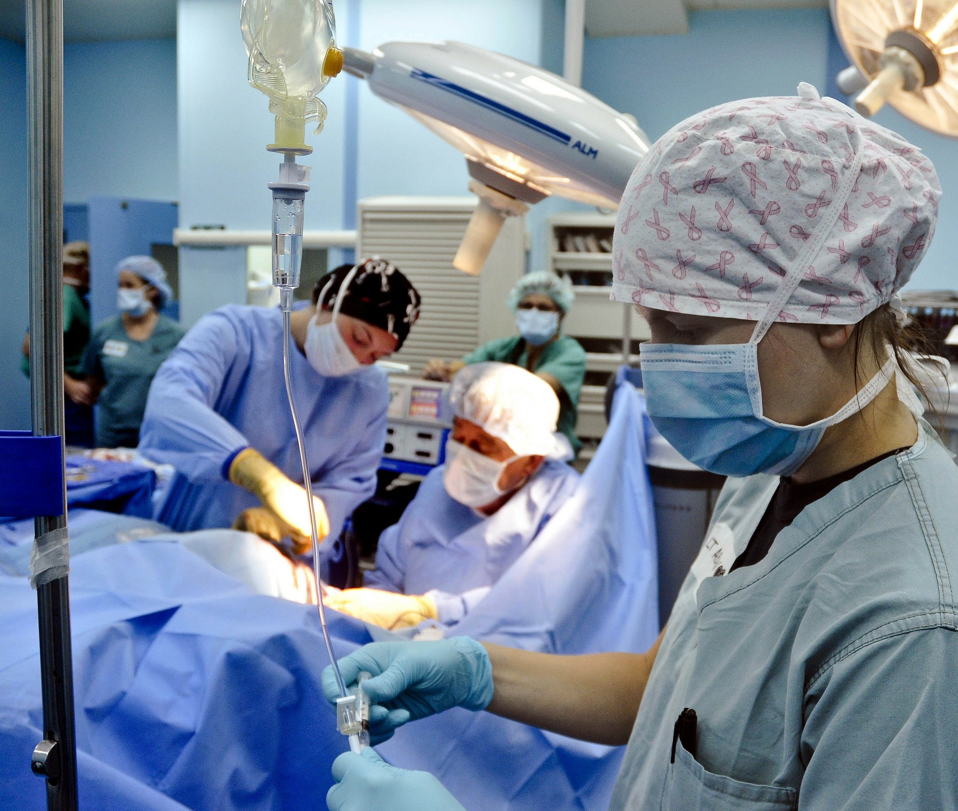 surgeons operating on a patient